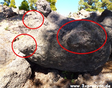 Ein Felsbrocken mit mehreren abgerundeten Vorsprüngen.